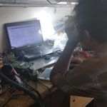 Proses Perbaikan Laptop dengan Membaca Skema